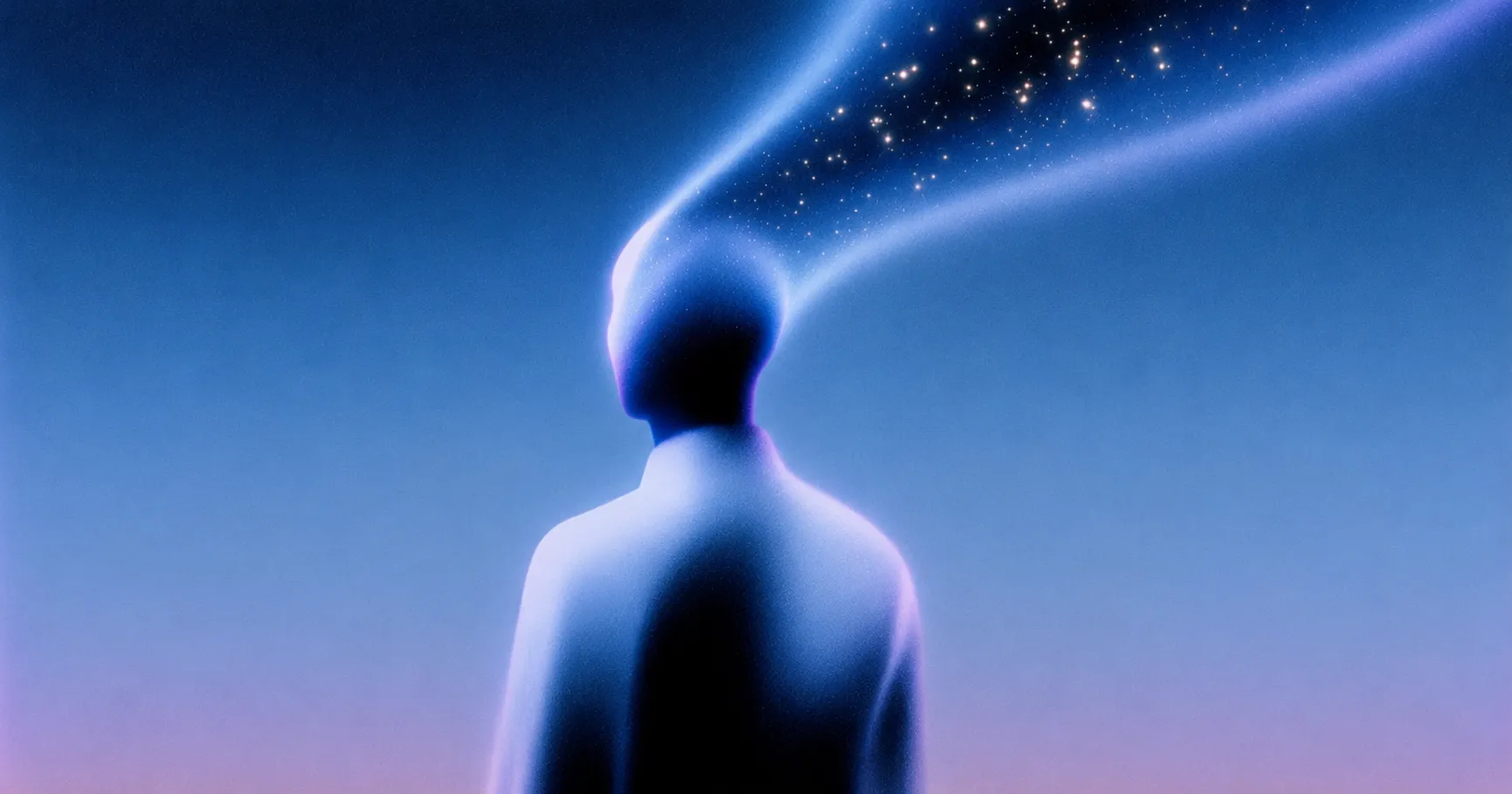 Silhouette of a person looking up at a stream of stars